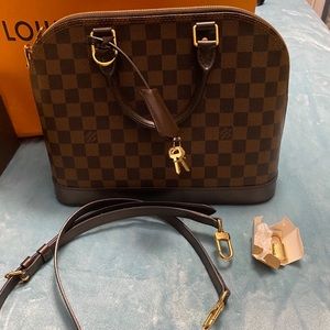 Real Louis Vuitton Alma pm brown satchel
